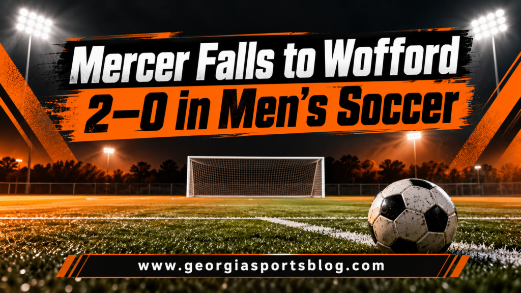 Orange and black soccer graphic titled Mercer Falls to Wofford 2–0 in Men’s Soccer with an empty goal and www.georgiasportsblog.com.